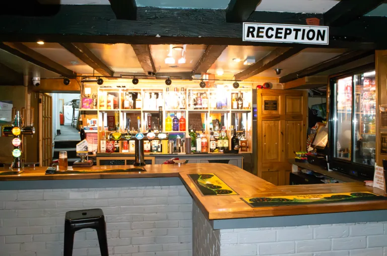The White Hart Bodmin bar and reception area with old beams
